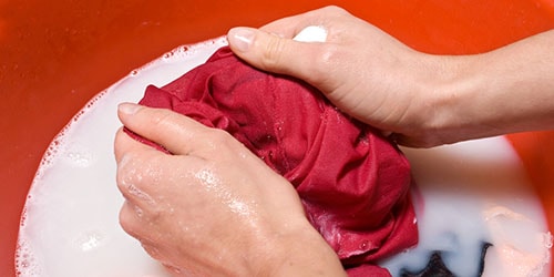 к чему снится стирать грязное белье руками